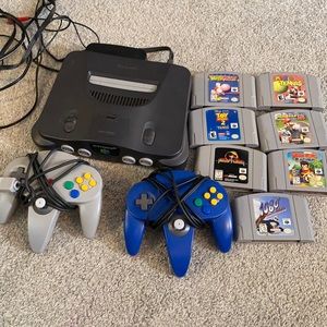 Nintendo 64 with 2 controllers and 7 games.